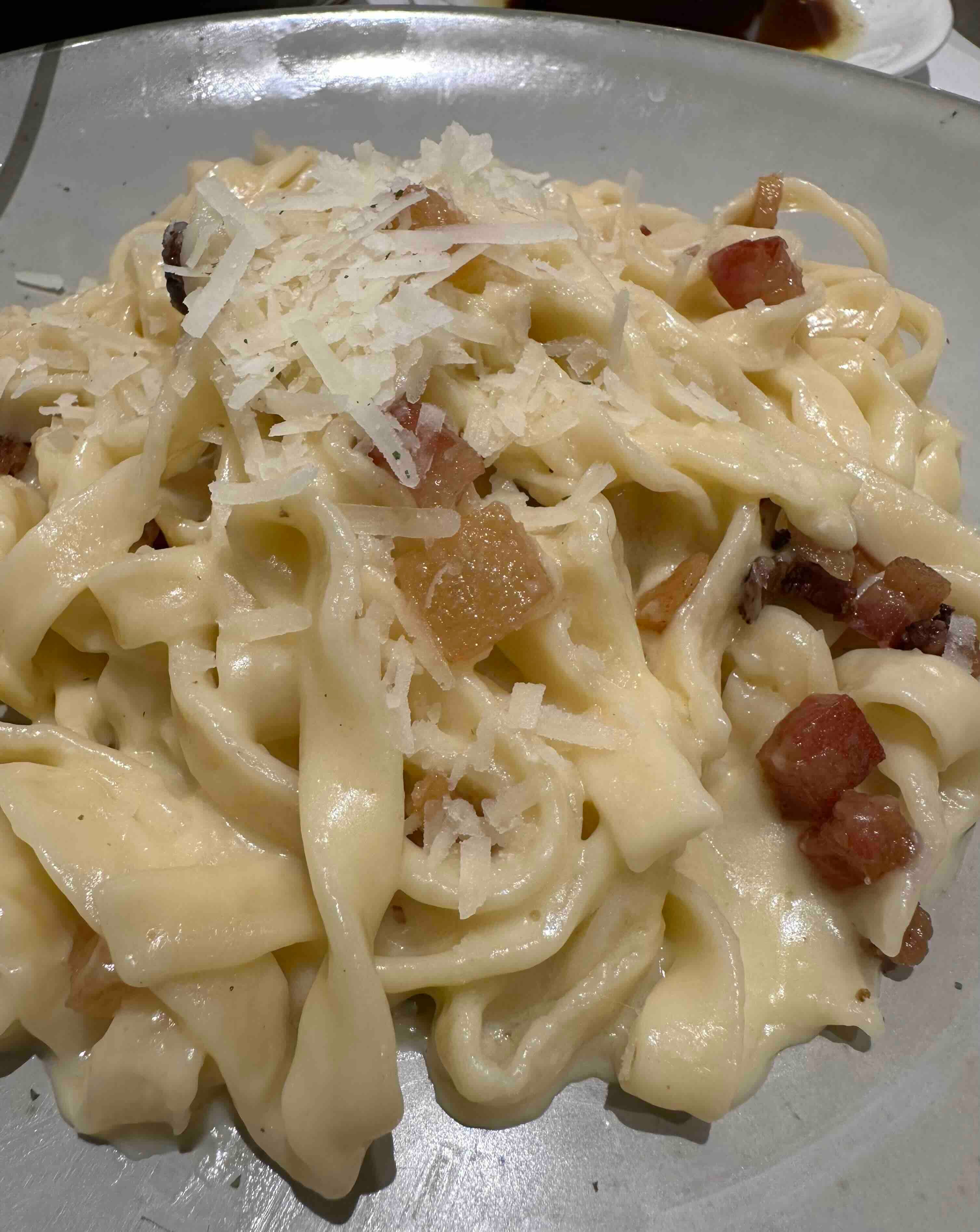 Handmade carbonara with guanciale and pecorino